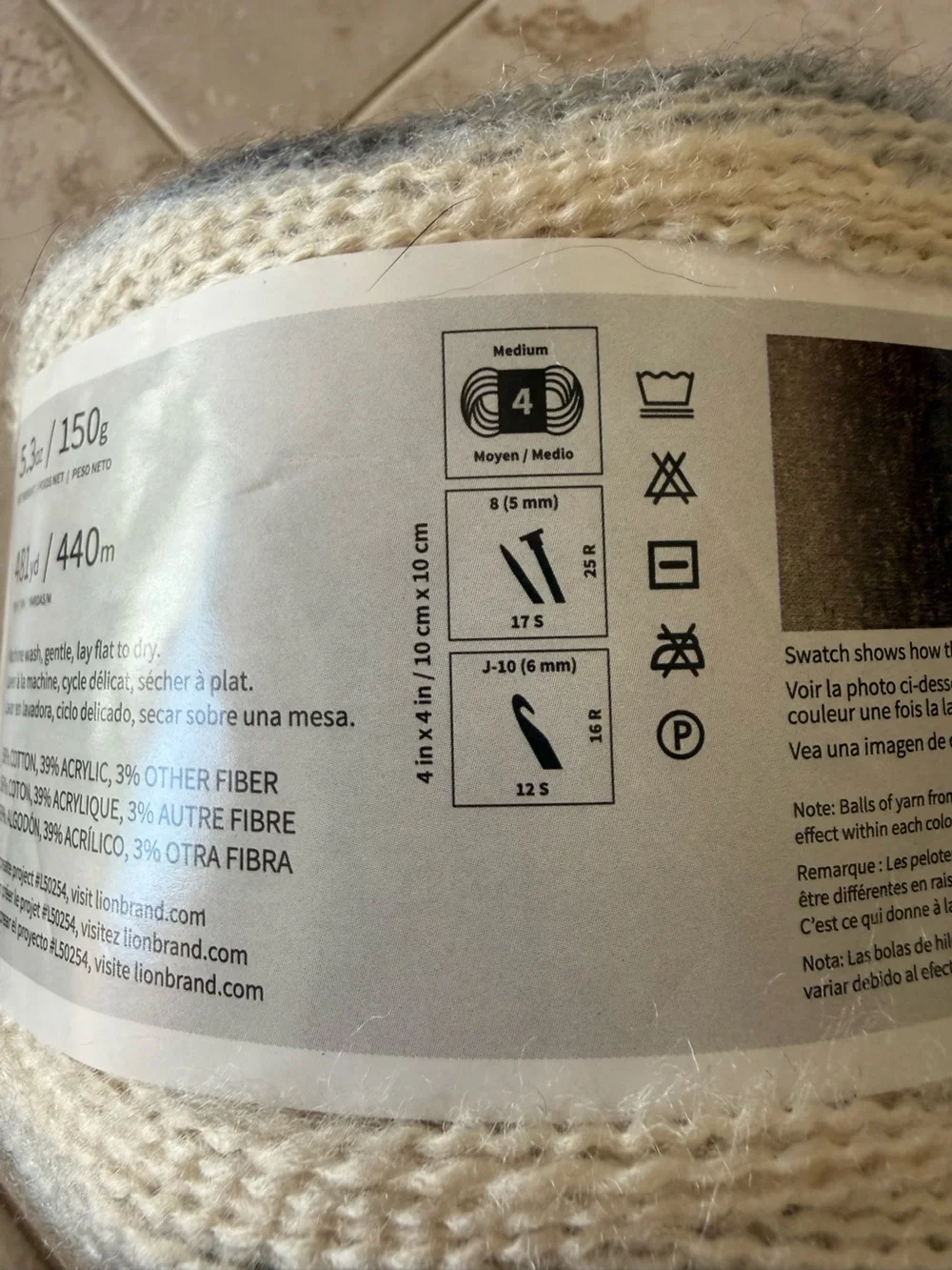Lion Brand Shawl In A Cake Mantilla Pastel Yarn - Cream & Gray - Feng Shui Grey